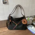 Retro black suede shoulder bag with brown straps, chic crossbody hobo bag for women. - Black