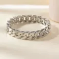 Silver chunky chain link bracelet for women, stylish metallic arm cuff fashion accessory. - Twisted Chain Bracelet / Silver