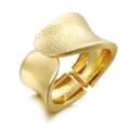 Golden wide cuff bracelet for women, statement metal hinge bangle with hammered texture chic. - Asymmetric Pattern Leaf Bracelet / Gold