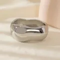 Silver metallic irregular open cuff bracelet for women, stylish vintage arm ring accessory. - Wide Irregular Geometric Bracelet / Silver