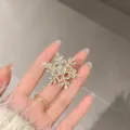 Pinza de pelo de copo de nieve con pedrería, horquilla lateral de cristal brillante. - Dorado Cristal Copo de Nieve