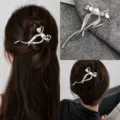 Elegant silver snake ribbon hair claw clip with pearl detail for stylish women daily updos. - Bowknot Silver