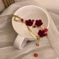 Horquilla de pelo dorada con forma de serpiente con flores de terciopelo rojo elegante - Aterciopelado Rojo