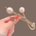 Gold metal hair clip with dual pearl ends, stylish cross hairpin for elegant daily hair styling. - Double Pearl Gold