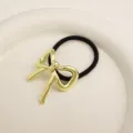 Minimalist metal bow hair tie elegant geometric ponytail holder black elastic rope for women daily wear - Bow Gold