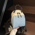 Schicker Canvas-Muschel-Rucksack für Damen, farbblockierte Freizeittasche und Umhängetasche. - Blau