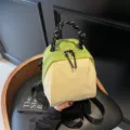 Lime green and beige mini backpack shell bag for women with top rope handle and zippers - Green