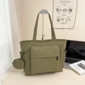 Grüne Canvas Tragetasche große Kapazität Schultertasche mit Vordertasche und Münztasche Alltag. - Grün