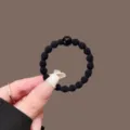 Coletero elástico negro con perla, cuerda de pelo duradera y resistente para la coleta diaria. - Negro