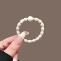 Coletero ondulado beige con cuenta blanca, banda elástica resistente para peinados diarios. - Beige