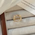 Minimalist gold irregular open ring for women, stylish alloy vintage finger jewelry accessory. - Gold Hollow Round