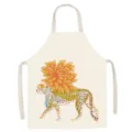 Detailed view of beige cotton canvas apron featuring a retro leopard and flower print. - Yellow Floral Leopard