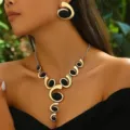 Gold-tone oval swirl earrings and Y-shaped necklace jewelry set for women fashion vintage style. - Turmeric