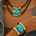 European American retro necklace bracelet set with blue acrylic pendant and gold metal tubes. - Simulated Turquoise and Golden Yellow
