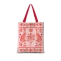 Vue détaillée du sac cabas en toile rose avec un imprimé vintage rouge de tigres et fleurs. - Romantisme Vertical 03 - Sangle Rouge