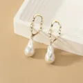Minimalist gold geometric hollow earrings with baroque pearl pendants for daily party wear. - White