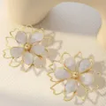 Double-layer hollow flower earrings with white enamel detail, elegant daily jewelry. - Off White