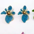 Elegant blue flower enamel earrings with gold tone details, perfect summer fashion jewelry gift. - Teal