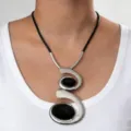 Exquisite detail view of the European bohemian spiral necklace with black oval acrylic stones. - Double Spiral Silver Gray Necklace
