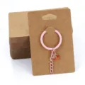 Kraft paper keychain display cards set with pink ring charm and beads for jewelry packaging. - 50Pcs/Bag / Khaki