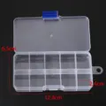Transparent plastic storage box detail showing 10 compartments and blue latch mechanism. - 10 Grids (2.4x6.5x12.4cm)
