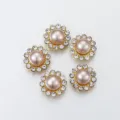 Detail shot of gold sunflower faux pearl rhinestone buttons for DIY crafts and clothing decor. - 50 Pieces/Pack / Gold Base Light Pink