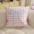 Pink and white checkered throw pillow featuring a cute blue bow detail for cozy room decor. - 35x35cm (Without Core) / Pink