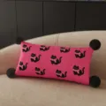 Pink rectangle throw pillow with cute black cat pattern and pom poms detail for cozy home. - Party Pink Cat (Long) Black Pom-Pom