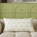 Decorative rectangular throw pillow featuring a green bow print on white fabric for couch. - 30x50cm (Without Core) / White Bowknot