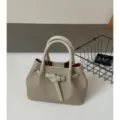 Bolso de mano texturizado minimalista para mujer, bolso pequeño versátil con correa elegante. - Sin colgante / Gris