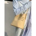 Geflochtene Beuteltasche für Damen Sommer ausgehöhlte Umhängetasche schicke Strohtasche - Gelb