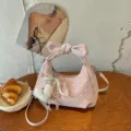 Pink polka dot shoulder bag with bow handle and cute heart charm stylish hobo handbag - With Pendant / Pink