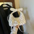 Stylish white polka dot hobo bag with bow handle and pearl heart pendant for women. - With Pendant / Off White