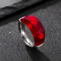 Detailed view of stainless steel red faceted zirconia ring, minimalist modern style jewelry. - Size 6 / Red Zirconia