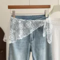 White floral lace waist wrap overlay with sheer mesh skirt design for stylish layered outfits. - One Size / Tops / White