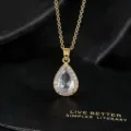 Close-up of sparkling teardrop zircon pendant necklace in gold tone, elegant jewelry detail. - Teardrop / 40+5cm / White