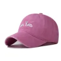 Pink washed cotton baseball cap with custom embroidered girl dad text for casual outdoor wear. - Adjustable / Pink