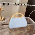 Light blue acrylic hard shell evening bag with gold metal handle and chain strap for women. - Light Blue