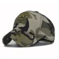 Close-up detail of camouflage baseball cap with embroidered star and army text design. - Adjustable / Camouflage