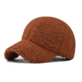 Close-up of brown sherpa fleece baseball cap showing soft texture and curved brim detail. - Adjustable / Caramel color