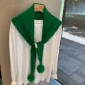 Green knitted hollow triangle scarf with pom-poms, versatile autumn and winter shawl. - Green