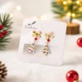 Boucles d'oreilles sapin de Noël avec nœud et détails en verre coloré, parfaites pour les fêtes. - Sapin de Noël en Verre Style 7