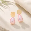 Close-up of pink pearl teardrop geometric earrings detail, elegant design for daily wear. - Teardrop Style (26080506-5)