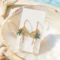 Gedetailleerd overzicht schelp zeester parel oorbellen zeestijl, elegante damessieraad strand. - Strass Groen Zeester Parel Stijl (26062815-7)