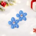 Blaue Blumen-Ohrstecker mit einem süßen Schneemann-Design, ideal für festliche Anlässe. - Blauer Schneemann