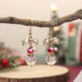 Boucles d'oreilles nœud cristal de Noël, bijoux pendants festifs avec perles iridescentes. - Boucles d'Oreilles Nœud Iridescentes 1