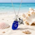 Blue sea glass pendant necklace with turtle charm, stylish oceanic silver clavicle chain. - Dark Blue Sea Turtle Necklace (22101709)
