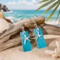 Ocean style blue sea glass and silver starfish drop earrings for women beach jewelry gift. - Lake Blue Starfish Earrings (24043002)