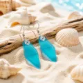 Beautiful blue sea glass hook earrings with wire wrapped design, ocean style jewelry for women. - Lake Blue Wire-Wrapped Earrings (24043004)