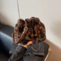 Fluffy leopard print bucket bag for women, soft plush crossbody handbag with amber bead handle. - Leopard Brown
